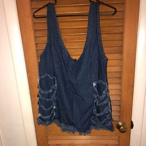 Distressed blue jean shirt